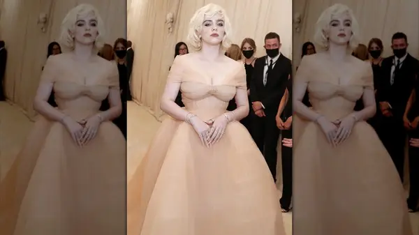 Billie EIlish wearing a large ball gown at the 2021 Met Gala