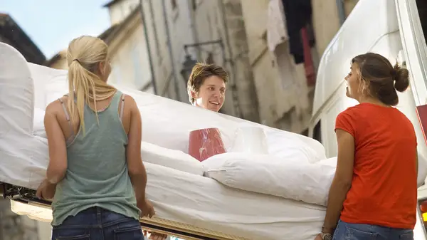 Friends helping move