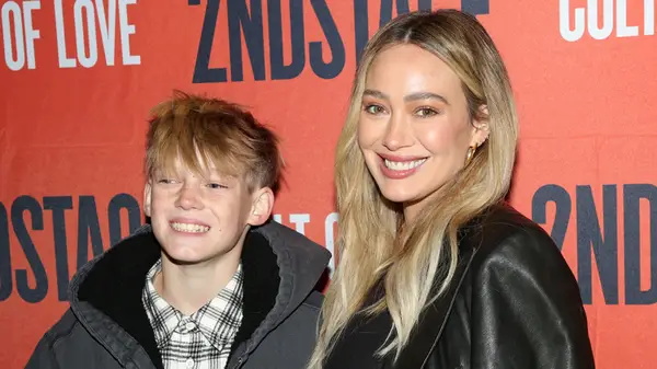 Hilary Duff poses with her son Luca Comrie at the opening night of Second Stage Theatre