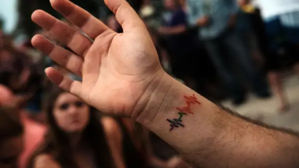 tattoo of a pulse on someone