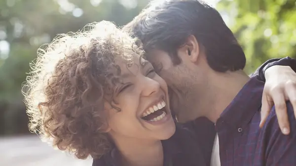 man and woman embracing