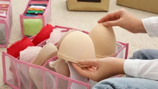 Women reorganizing her bras