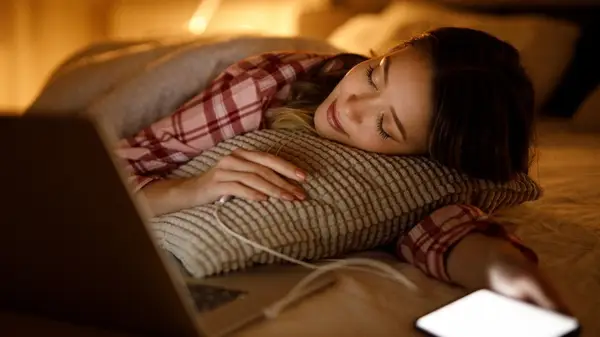 Woman listening to phone