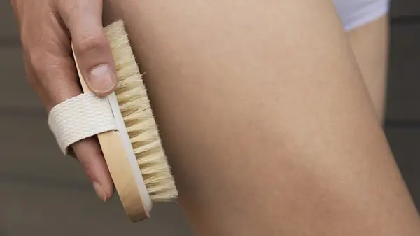 Person dry brushing