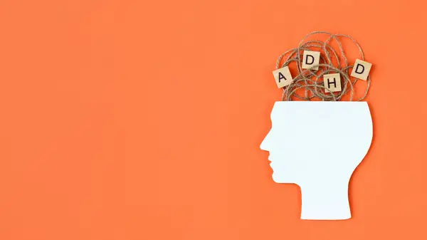 adhd letters coming out of a human profile in silhouette