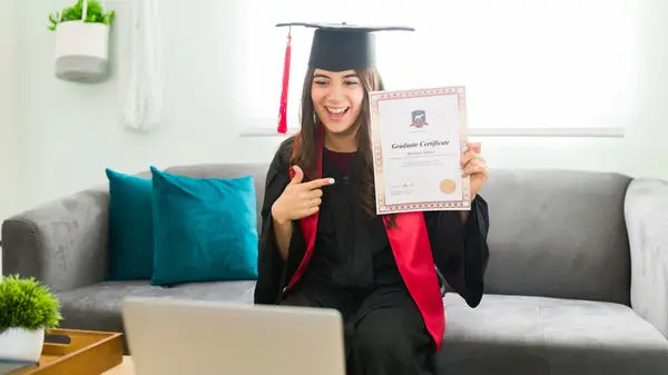 woman holding diploma