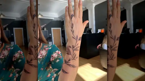 Vine arm tattoo