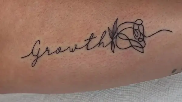 Growth script tattoo