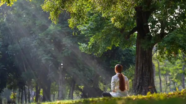 Woman meditating in nature
