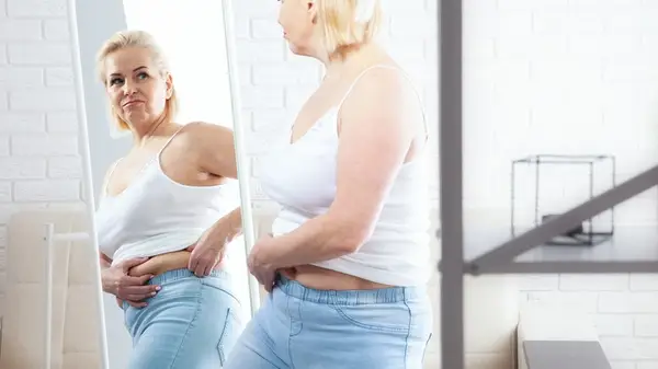 Woman looking in the mirror 