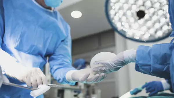 Surgeon performing surgery