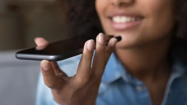 Woman speaking into her phone