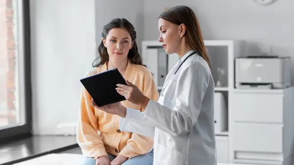 Woman seeing a doctor