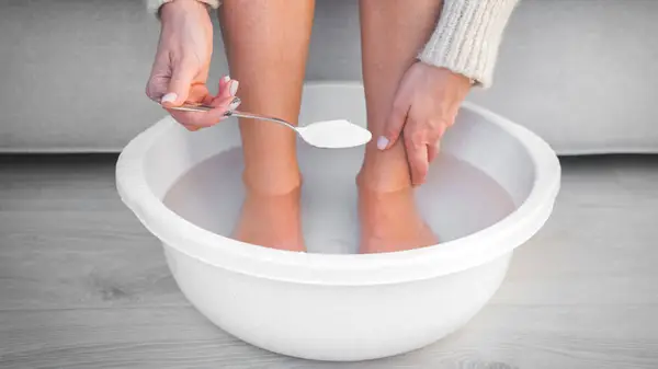 Woman soaking feet