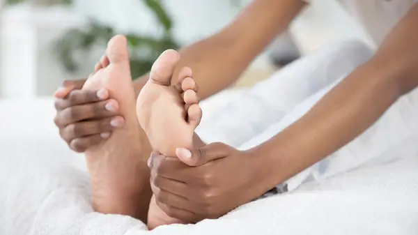 Person touching feet