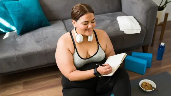 woman holding journal
