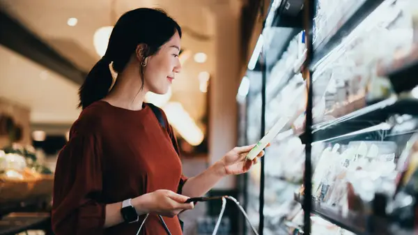 Woman goes grocery shopping