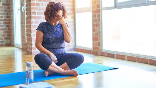 Woman experiencing headache