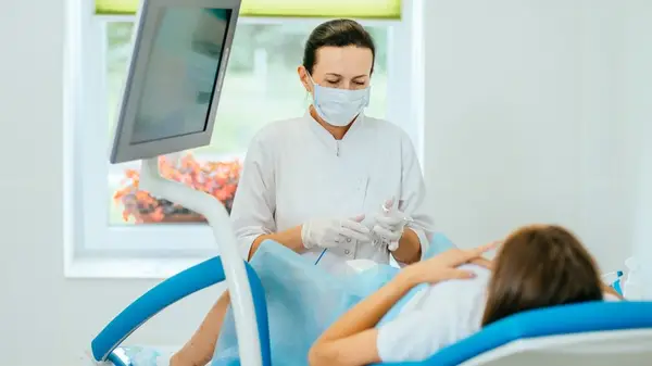 Woman on examination table