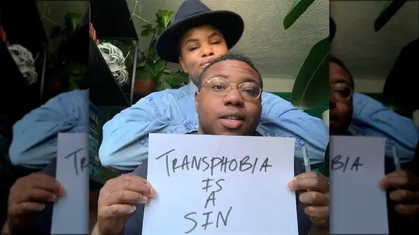 Ericka Hart with Ebony Donnley holding up a sign