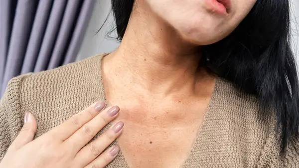 Woman checking on her skin