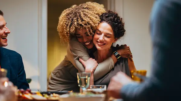Friends happy together at dinner 