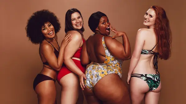 Women posing in swimsuits