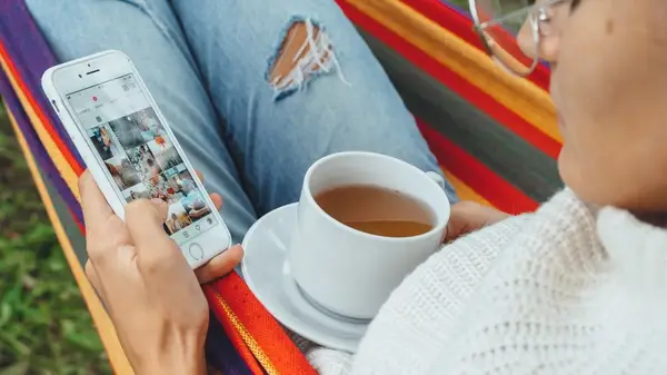 Woman scrolling on phone